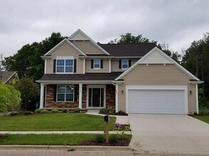 Building Photo - Executive Living at Its Finest — Okemos, MI