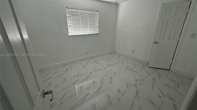 Building Photo - 6365 Miami Lakeway S