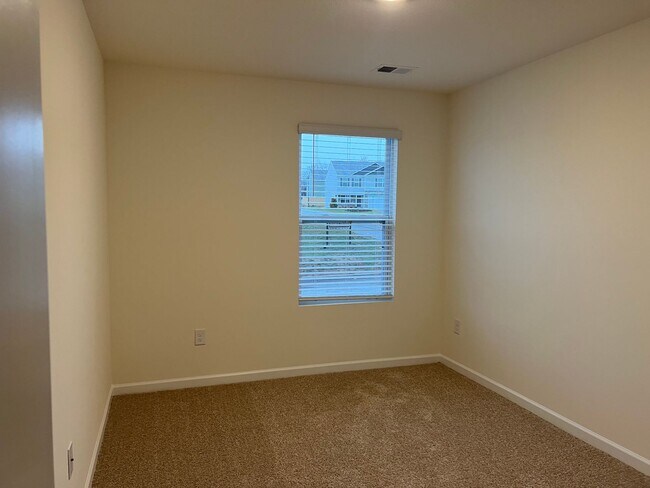 Building Photo - Beautiful New Construction 3 bedroom 2.5 Condo   with garage- Water, trash & sewer incuded!