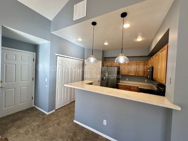 Building Photo - 9064 W Phillips Dr