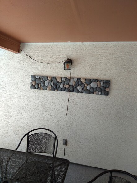 New Stone Veneer in rear patio - 1671 N Garrett Dr