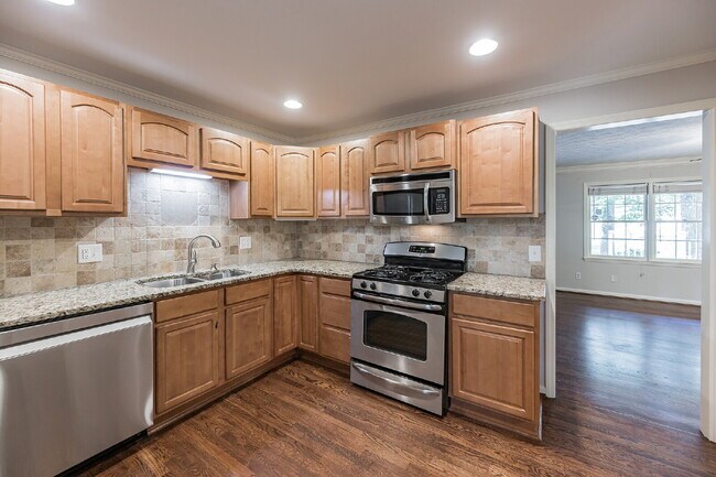 Building Photo - Freshly Updated Lassiter District Home with Finished Basement & Huge Backyard