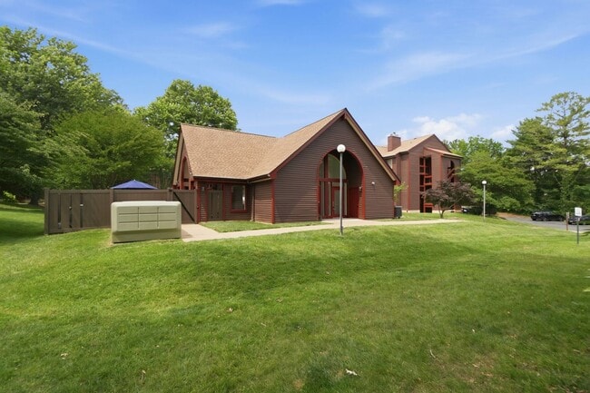 Building Photo - Contemporary design meets exceptional space in this inviting ground level residence, offering eff...