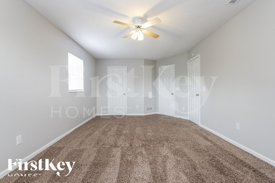 Building Photo - 7474 Carnation Ln