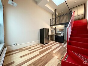 Building Photo - Charming Contemporary 1 Bedroom Loft