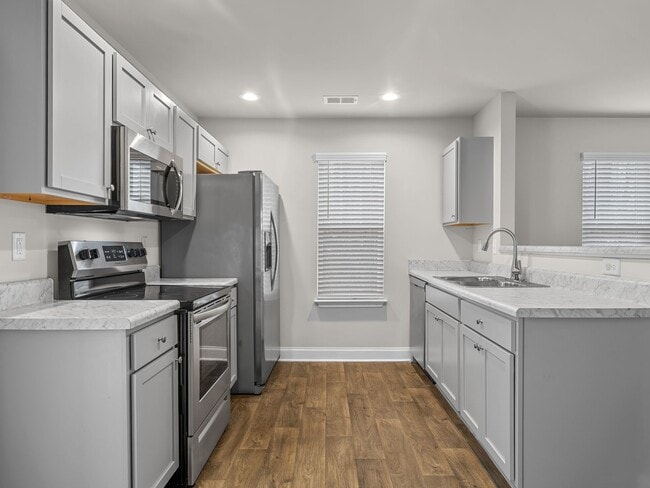 Building Photo - Charming two bedroom two and a half bathroom ready for you to call home!