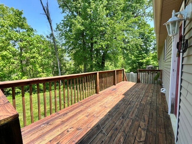 Building Photo - Spacious 3BR Duplex with Finished Basement & 2-Car Garage in Otsego