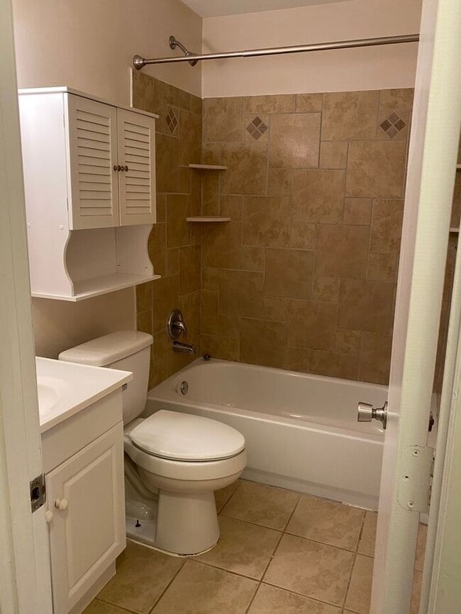 Building Photo - COMING SOON! 4Br, 2.5 baths, large kitchen, large bedrooms, fence, storage and more! N. College R...