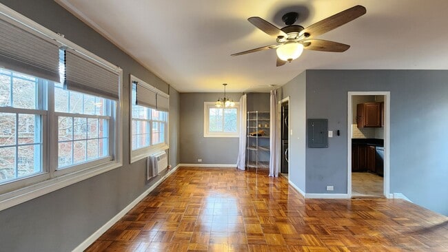 Building Photo - Spacious and Bright End Unit in Park-like Setting