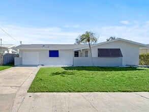 Building Photo - Amazing Indian Rocks Beach Waterfront Rental – Dock, Boat Lift & Garage! 3bed | 2bath