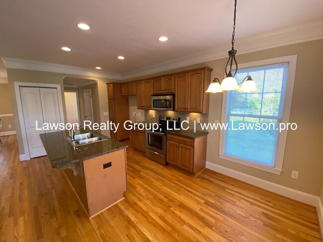 Building Photo - Colonial Green Row Home with Two Car Garage