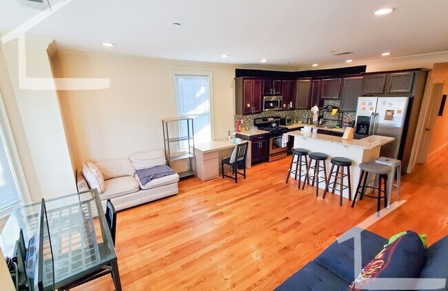 Building Photo - Spacious Townhouse: 4-bed, 3.5 bath unit in Brighton with Garage Parking