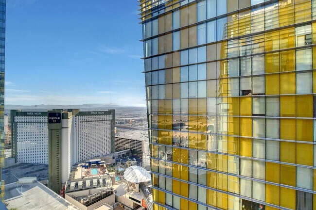Building Photo - Stunning Strip Views from this Fully Furnished Studio Residence.