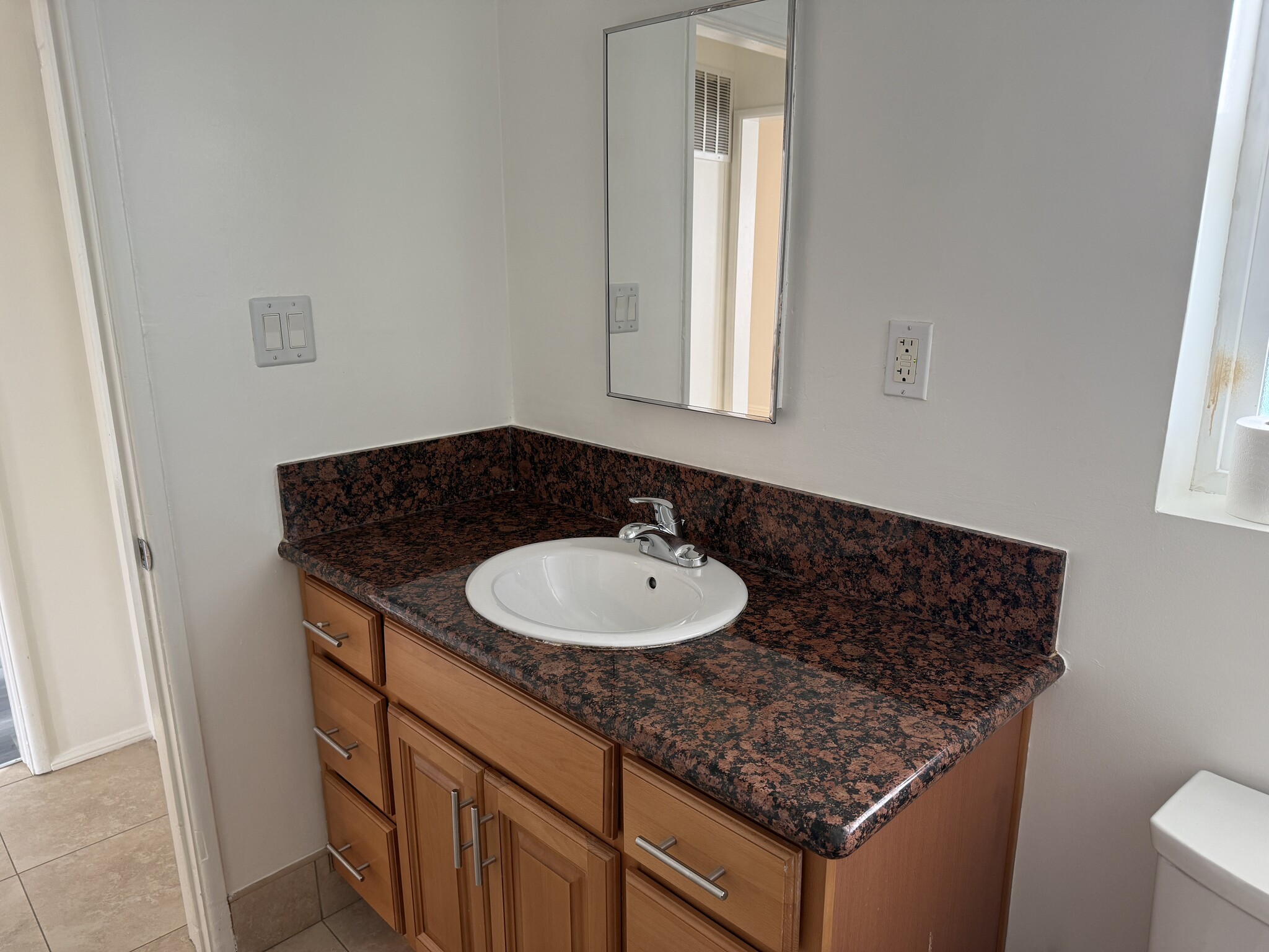 Bathroom updated, newly painted with vanity set - 5462 Barton Ave