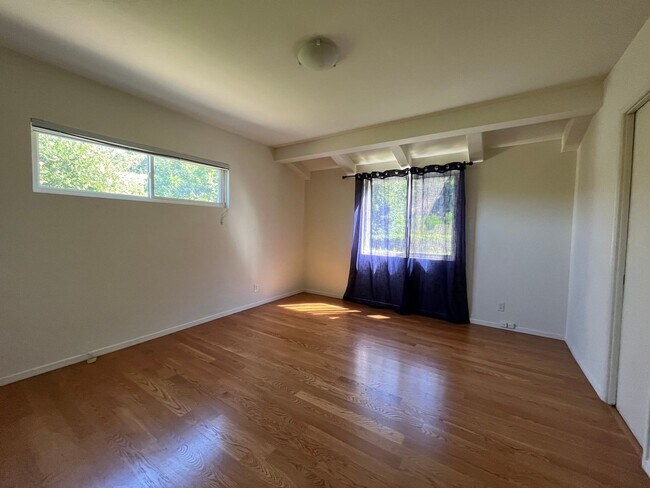 Building Photo - A hidden gem with tree-top view. Tranquil and private. Light and airy