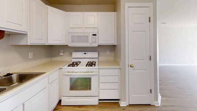 Building Photo - Townhome | Hard Surface Floors Through-Out...