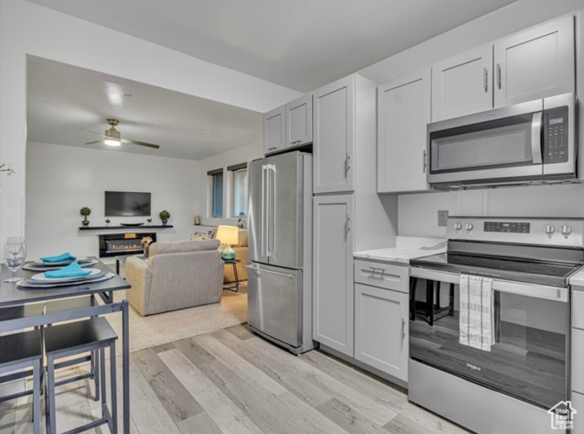 Kitchen to Living Room - 14902 S Saddle Leaf Ct