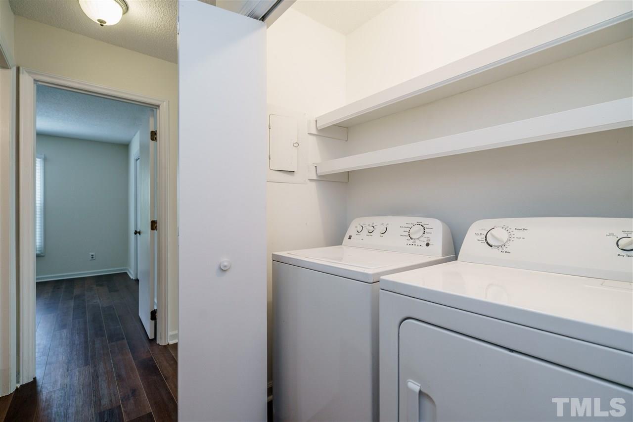 Washer and Dryer in unit hallway - 4702 Cornwall Plz