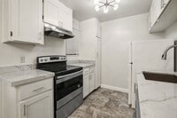 Building Photo - Peaceful Forest-View Condo with Fireplace & Private Balcony in Golden Oaks