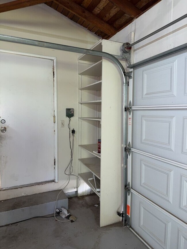 Building Photo - Charming 3-bedroom, 2-bathroom home is nes...