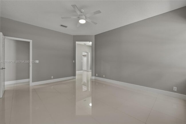 Building Photo - 5285 NW 112th Terrace