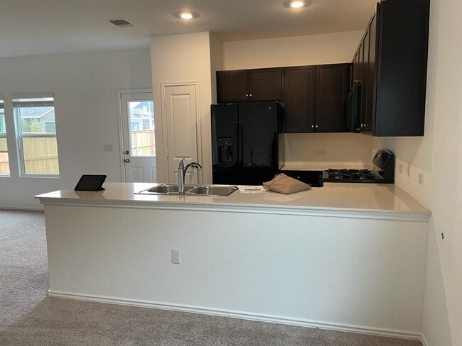 Building Photo - 7501 Poppy Petal Dr