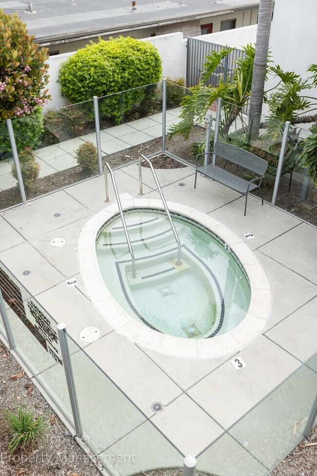 Building Photo - 2-bed, 2-bath 972sqft condo, walking distance to beach in Carlsbad Village, literally one block o...