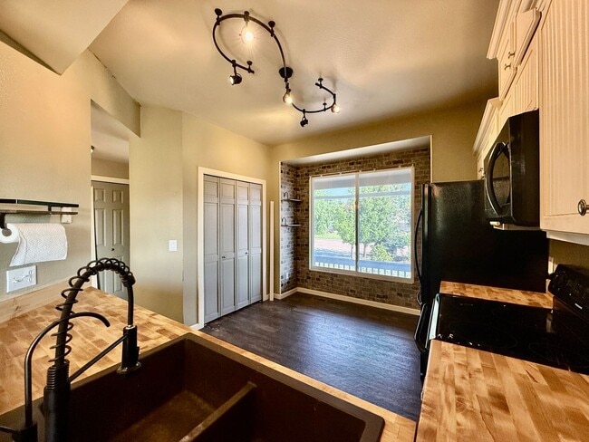 Building Photo - Spacious 4-Bedroom Home on Half an Acre in...
