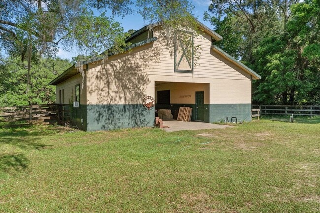 Building Photo - 9525 Woodland Hills Way