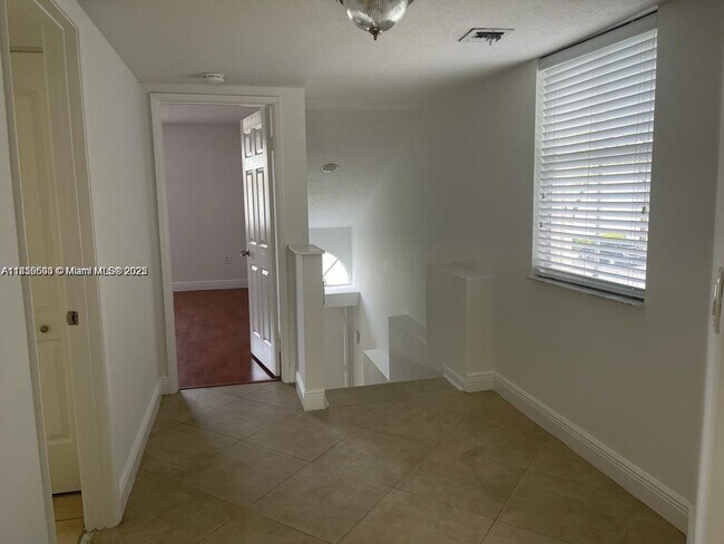 Building Photo - 4871 NW 97th Ct