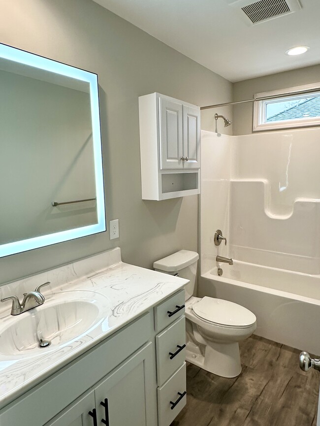 Oversized LED mirror with dimmable color & defog options - 2229 Kenwood Blvd SE