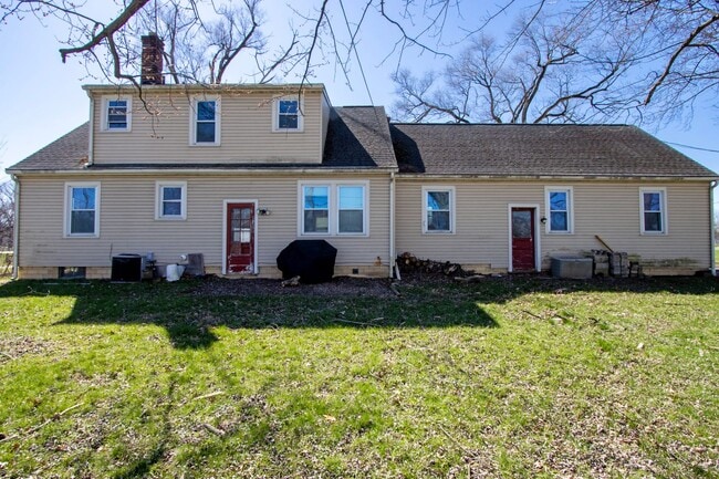 Building Photo - Four Bedroom Single-Family Home