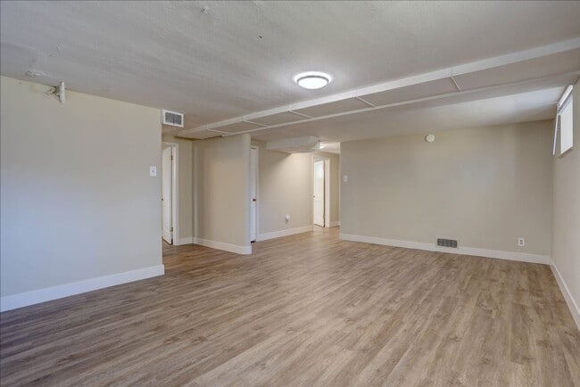 Building Photo - Spacious Sunnyside Bungalow, Finished Basement, 2-Car Garage