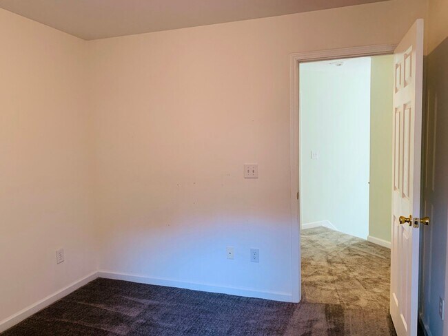 Building Photo - Great location! Lawncare/water is included...
