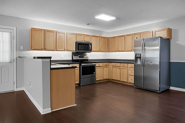 Building Photo - Spacious 2 Story, 4 BR, 2.5 BA, 2 Car Gara...