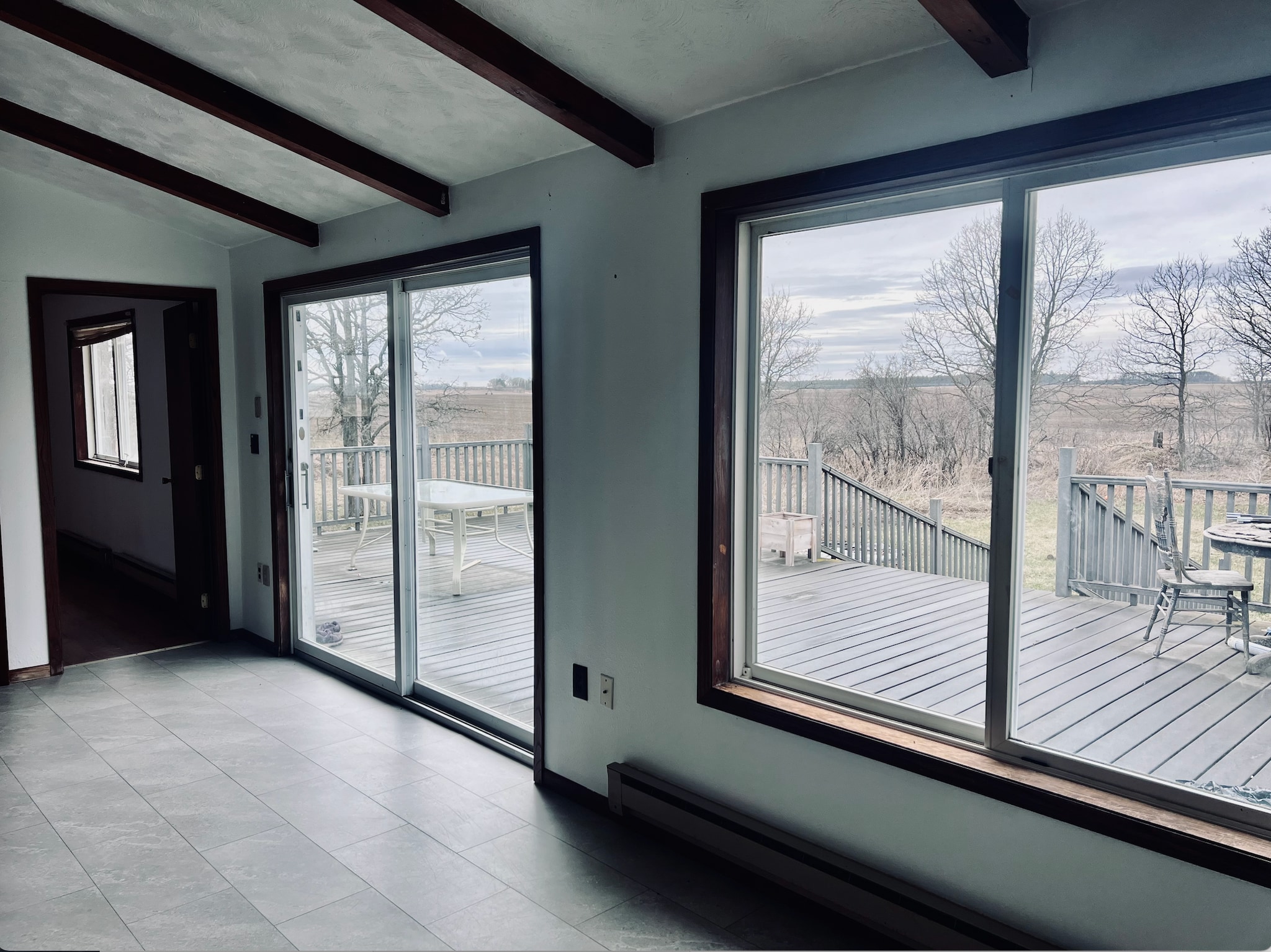 Living room looking out onto the patio. - 13433 County 13