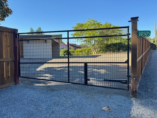 Building Photo - Stunning Deck and Pool for this Updated Mi...