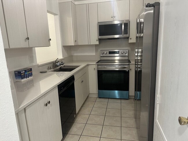 Building Photo - Spacious 2-Bedroom, 2-Bath Condo – Fully R...
