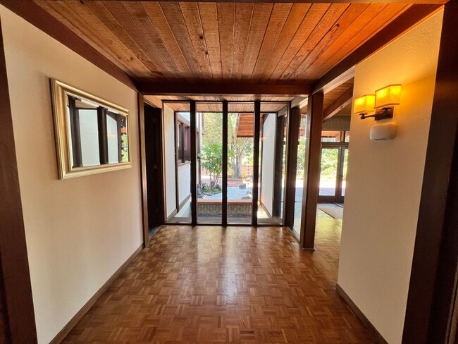 Building Photo - SPACIOUS FOUR BEDROOM TWO AND HALF BATH CH...