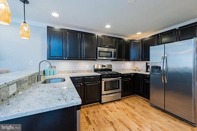 Kitchen with stainless steel appliances - 217 S Regester St