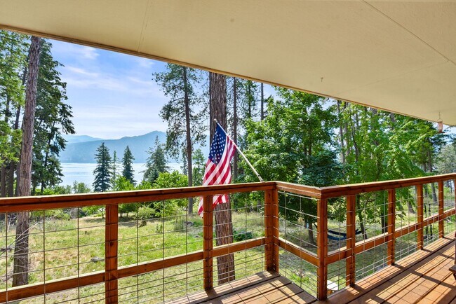 Building Photo - 2700 + sq ft family home has it all! Over 2 acres of land and a stunning view of Lake Pend Oreille