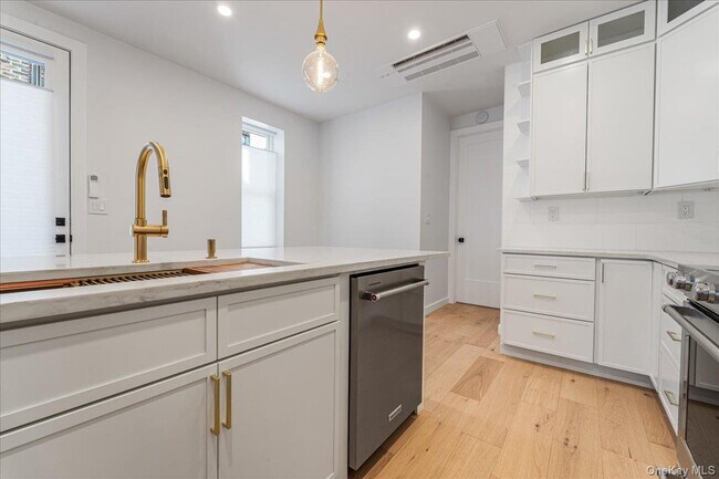 Building Photo - 36-34-36-11 11th St