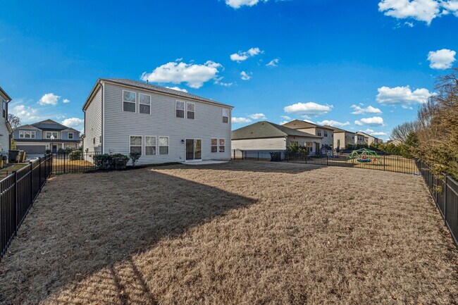 Building Photo - Classic finishes paired with an open, versatile layout!