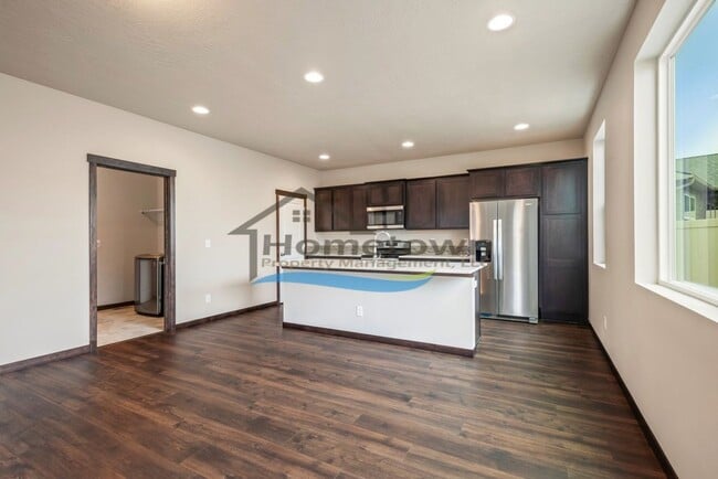 Building Photo - Woodbridge South Home with 4 Bedrooms and 3 Bathrooms in Post Falls build in 2021!