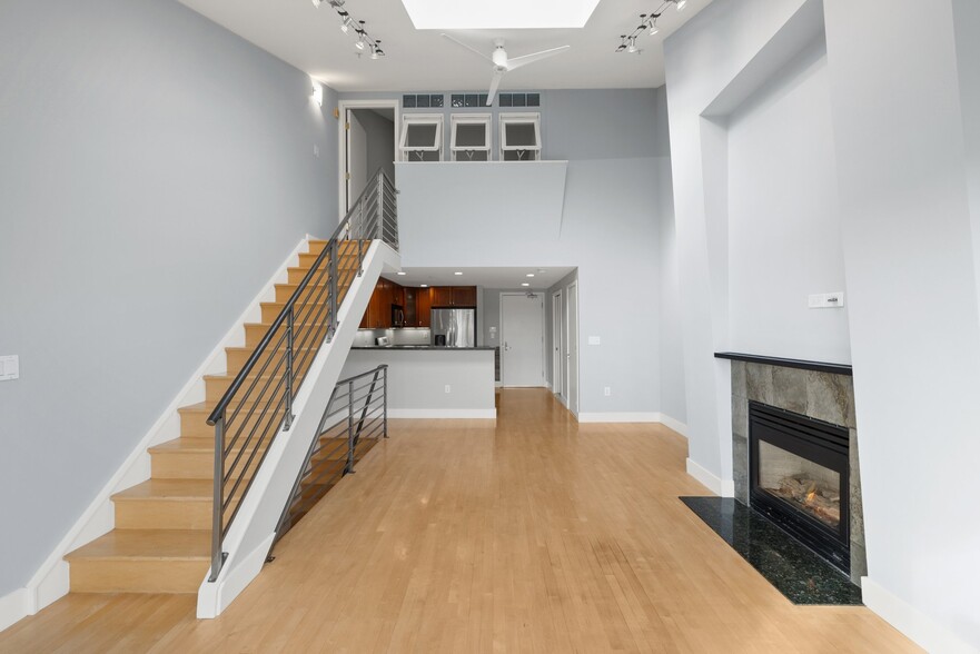 Main floor living/Stairs to 2nd bedroom - 588 S Van Ness Ave