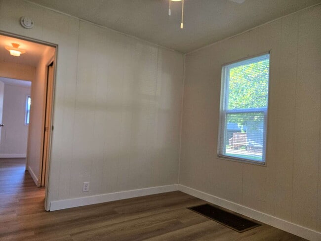 Building Photo - Room to Roam — Updated 2 Bed with Huge Yard & 2-Car Garage