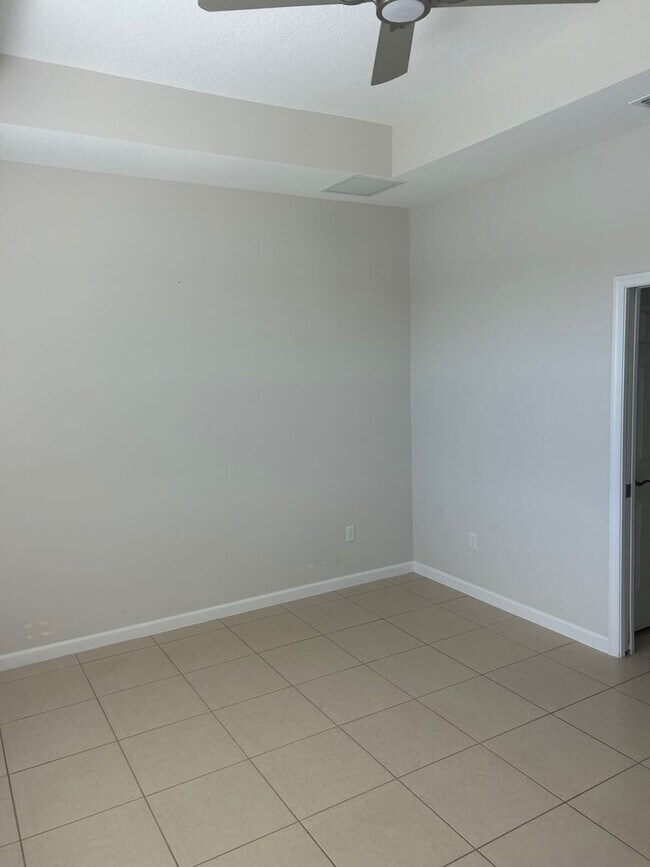 Building Photo - Lake Front Home In Lake Park at Tradition