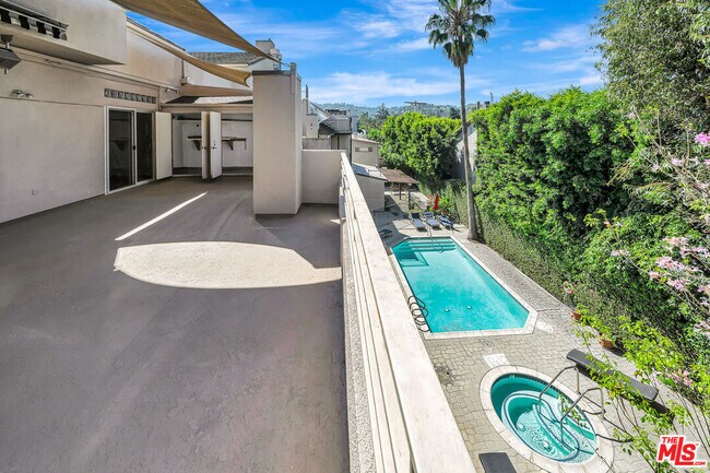 Building Photo - 4477 Woodman Ave