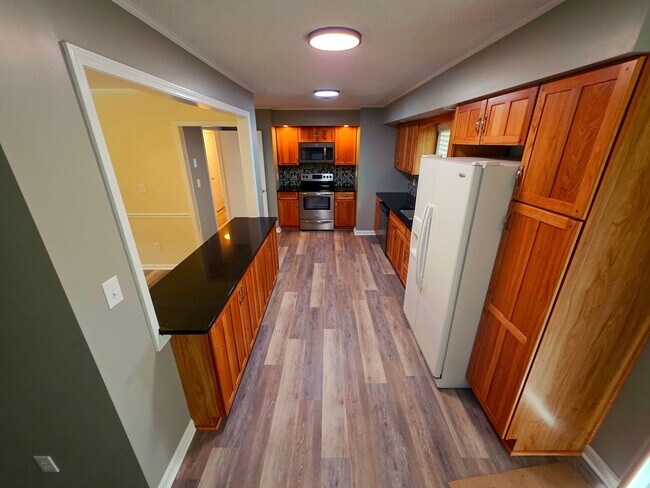 Building Photo - Nicely updated 3 bedroom, 2 bath home with 1-car garage