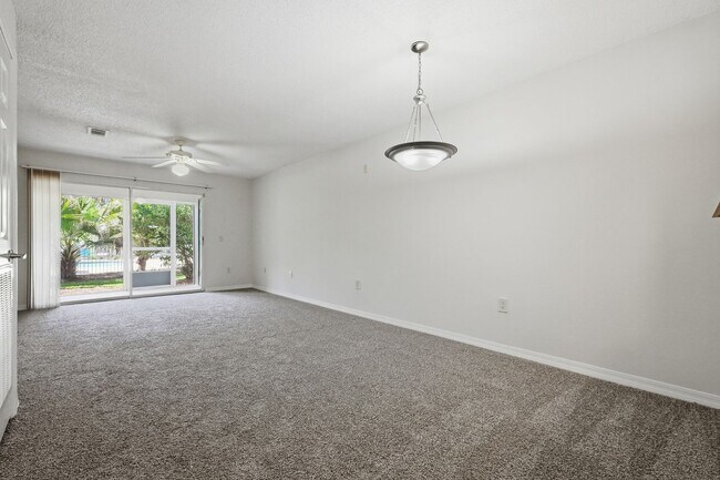 Building Photo - Highly Sought After GROUND-FLOOR Unit at Florida Club!  Pool View!!